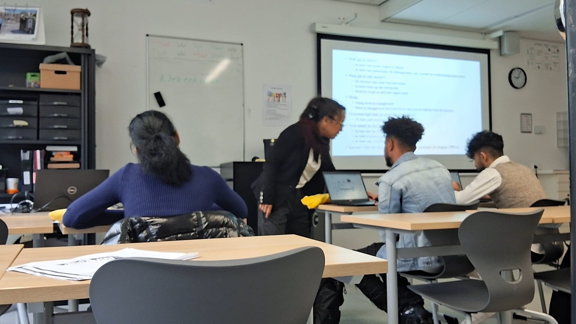 Teacher Dutch lesson in classroom